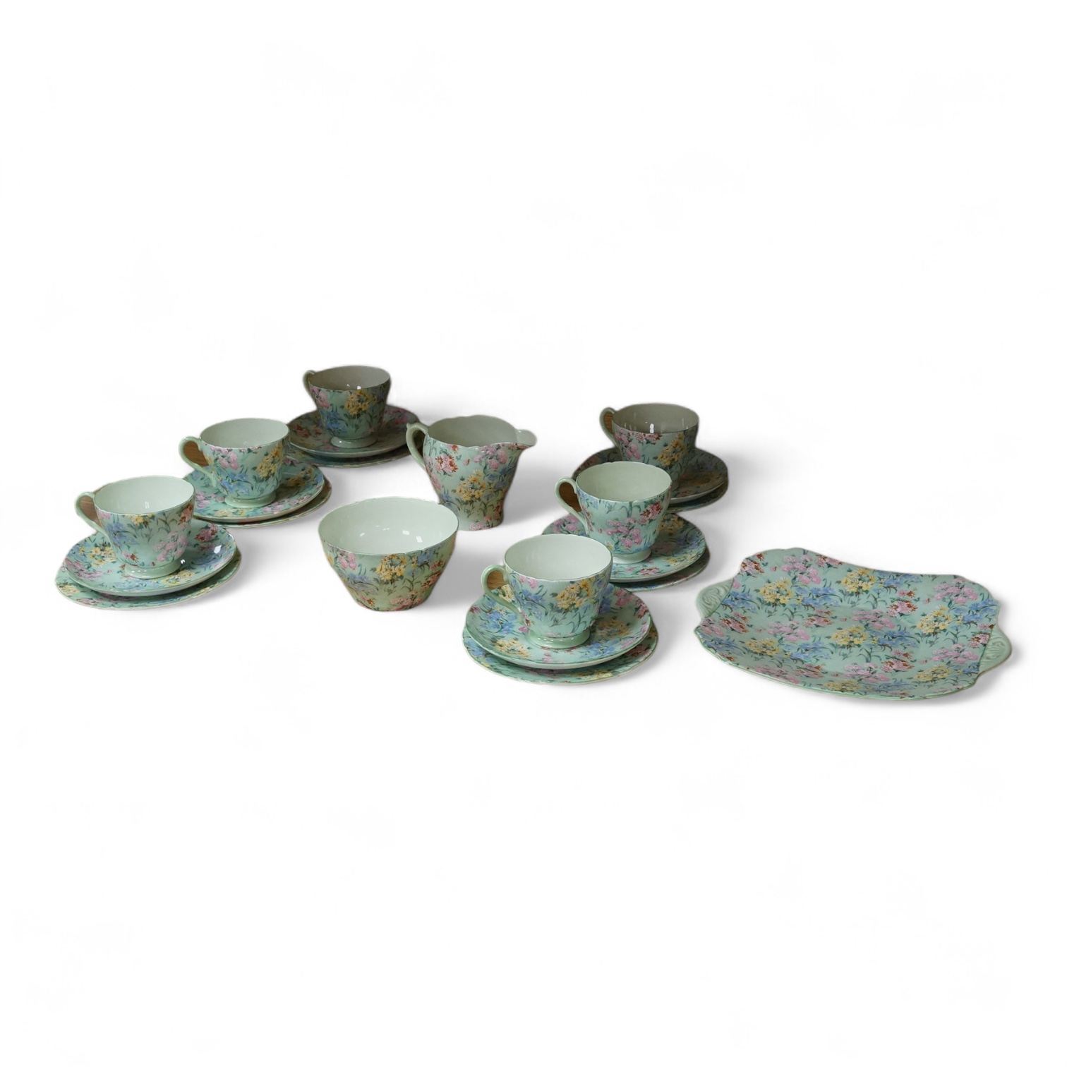 A Shelley ‘Melody’ porcelain six cup tea set, teapot missing, cake plate 25cm square (21)